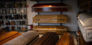 Showroom with coffins and urns.