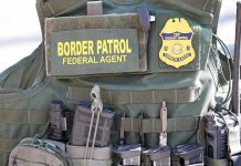 SWAMP SWEEP: Feds Storm New Orleans – Why Now? Border Patrol vest with gear and communication equipment.