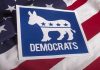 Democrat Civil War Erupts—Party Elders Cornered Democrats logo on American flag background