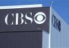 Trump’s EXPLOSIVE CBS Clash – Dems In DISSARAY! Exterior view of a CBS media building featuring the CBS logo