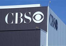 Trump’s EXPLOSIVE CBS Clash – Dems In DISSARAY! Exterior view of a CBS media building featuring the CBS logo