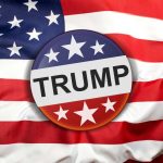 Button with Trump on American flag.
