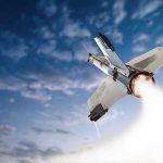 Rocket launching into the sky with clouds.