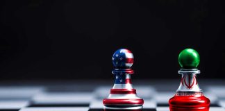 Chess pieces with USA and Iran flags on board.