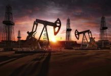 War Zone Transformation SHATTERS Oil Markets Oil rigs operating at sunset in a desert landscape.