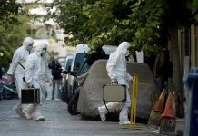 SWAT Surrounds Mansion — Millionaire Found DECOMPOSING Investigators in hazmat suits carrying equipment cases.