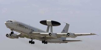 NATO AWACS aircraft taking off from an airfield
