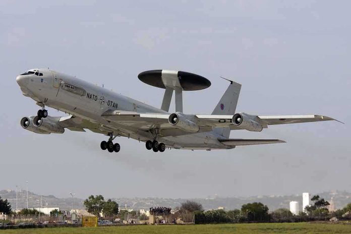 NATO AWACS aircraft taking off from an airfield