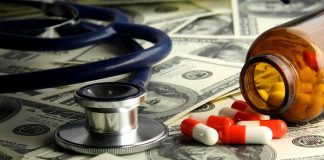 FELONY Charges For Mail-Order Abortion Pills Stethoscope and prescription pills on a background of dollar bills