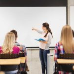 Idaho Democrat: Children “Become Ours” in Classrooms A teacher presenting to students in a classroom