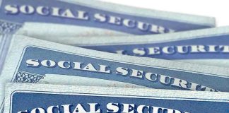 Stolen Social Security Numbers RAMPANT – ICE RAIDS Warehouse! Several Social Security cards stacked together.