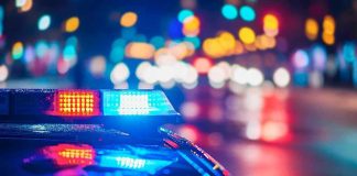 Baby THROWN From Car During Police Chase! Police car with flashing lights at night.