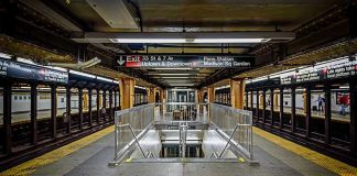 Psycho Illegal RAPED Dead Corpse For 30-Minutes! Subway station platform with directional signs overhead.