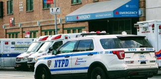 Knife-Point Predator on the Loose – Hunting Females! Police car and ambulances outside emergency room entrance.