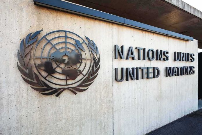 shutterstock_1838738371-1- Facade of the United Nations building featuring the UN emblem and text
