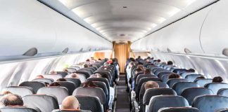 Preacher BOOTED OFF Flight When This Happened Airplane cabin with passengers seated in rows