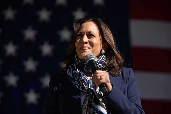 Woman speaking into a microphone on a stage