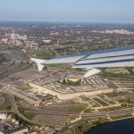 FAA Greenlights Trump’s D.C Plan airplane wing over a sprawling government complex