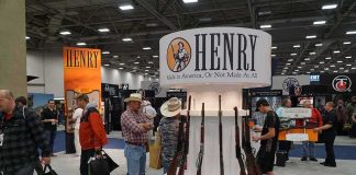 Henry booth with rifles on display at a trade show