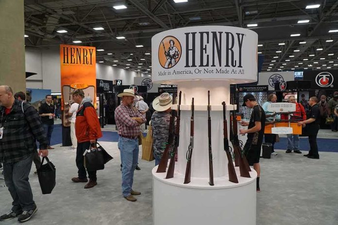 shutterstock_1099349978 Henry booth with rifles on display at a trade show