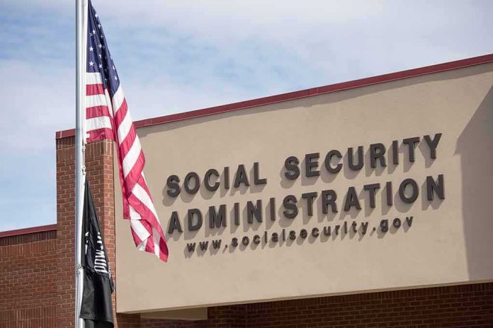 shutterstock_1332438944 Social Security Administration building with American flag