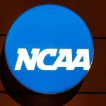 NCAA Football Star Killed in Nightclub Brawl NCAA logo on a blue circular sign