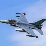 Bloody Marine Pilot Walks Away From Fireball Fighter jet banking in the sky