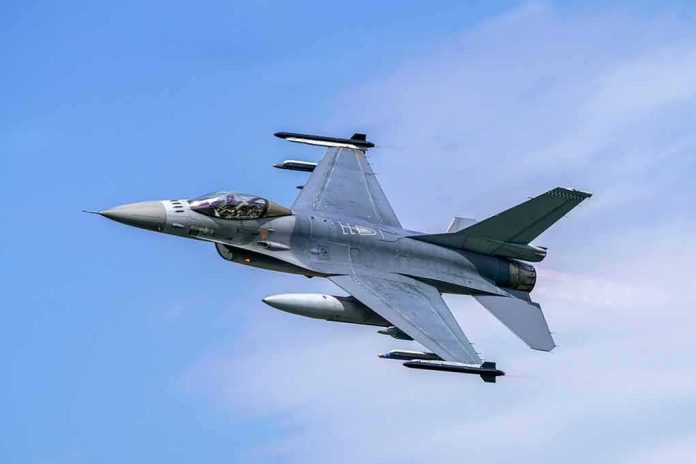 Fighter jet banking in the sky