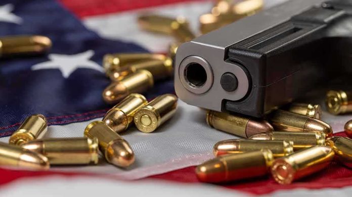 Handgun with bullets on an American flag