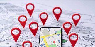 Vacation App Blunder Exposes U.S Troops Homes Smartphone with map app surrounded by red location pins