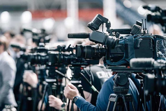 shutterstock_2197858977-2 Broadcast cameras on tripods at a press event