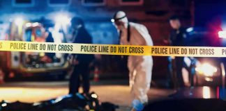 Police tape at nighttime crime scene