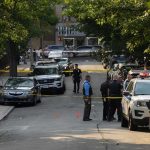 ‘Elijah’: Doctor Shouted His Attacker’s Name Before Being Stabbed to Death Police officers secure a residential street with patrol cars and yellow tape