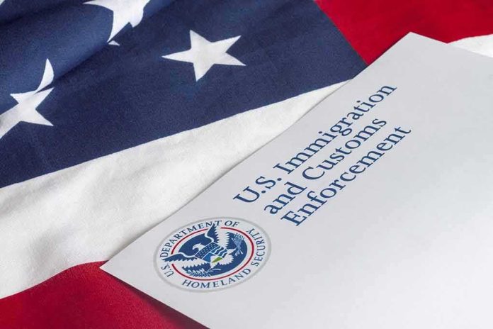 shutterstock_300476858 U.S. ICE document on American flag