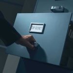 Leaked FBI Docs Shows Dem Rep Accepting Illegal Chinese Donations Hand opening a filing cabinet drawer labeled top secret