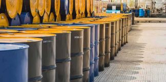 Saudis WARN Oil Reserves Scarily Thin Rows of industrial metal barrels with yellow lids