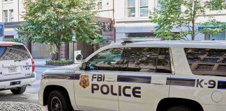 Capitol Attack Plot Foiled at 3 A.M. FBI police K-9 SUV parked on a city street