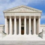Alito Announcement Sparks Retirement Frenzy Front view of the Supreme Court building with large columns and steps under a blue sky