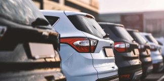 Row of parked SUVs in a lot