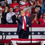 Protesters Ejected From Raucous Trump Rally Donald Trump points from a rally stage; Rudi Koertzen and Bear Pascoe are in the crowd