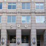 Attorney ARRESTED – Vowed to Kill ICE Agents While Buying Gun US government building facade with flags and number 500