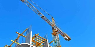 China Sets Up Caribbean Base – Too Close To Home Tower crane over concrete building under construction