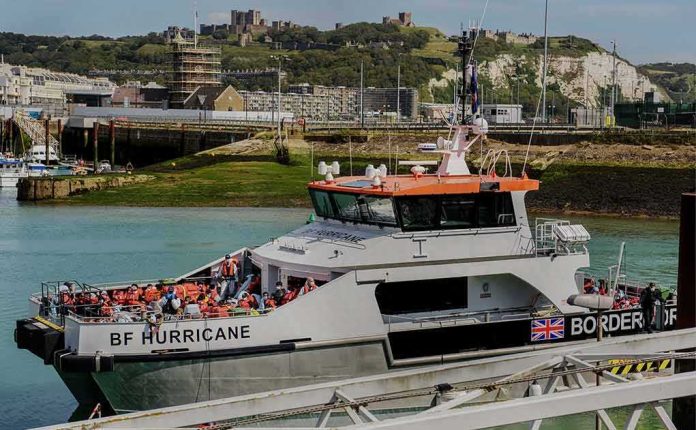 shutterstock_2166379241 Border Force patrol boat BF Hurricane docked in a harbor
