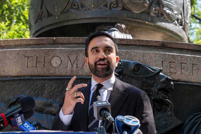 shutterstock_2668981483 Zohran Mamdani speaking at an outdoor press conference