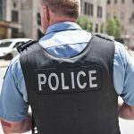 Police Ambush Horror Stuns City Police officer in uniform from behind on a city street