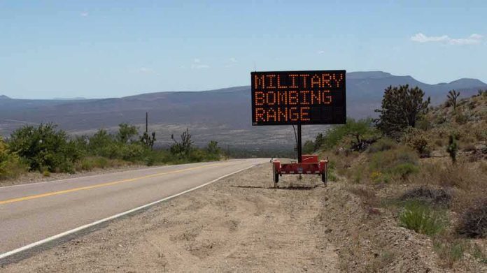 shutterstock_449022256 Portable electronic road sign on desert highway shoulder